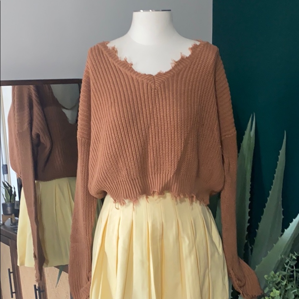 Cropped oversized distressed sweater
